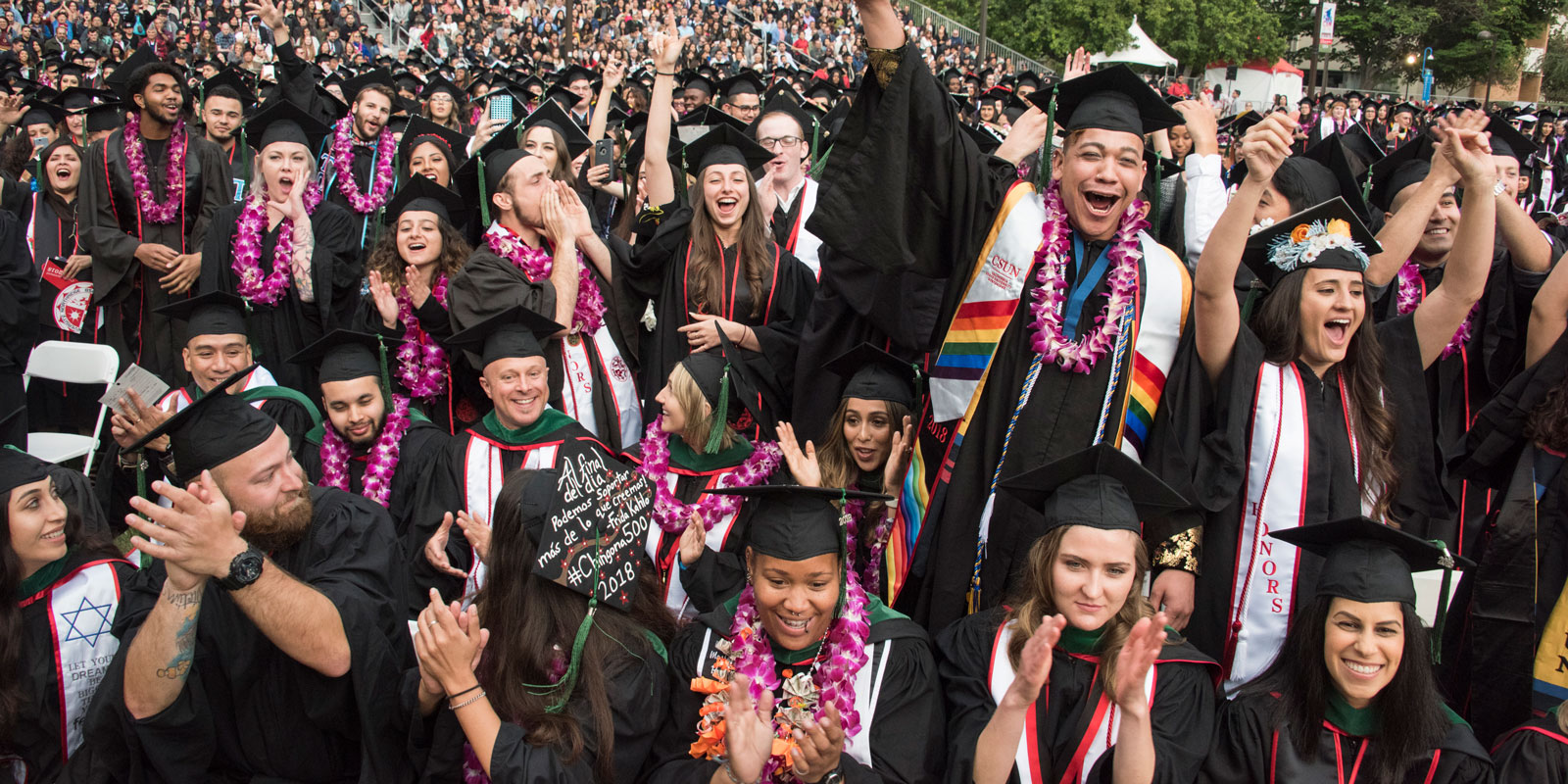 Diverse group of CSU graduate celebrating at their graduation